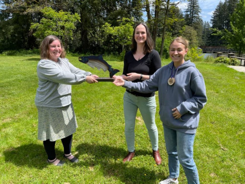 Picture caption: Sarah Keirns, Clark County Green Business program lead is pictured here alongside staff from Columbia Springs to accept the Clark County Green Business of the Year award.